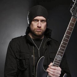 Andy James posing with guitar